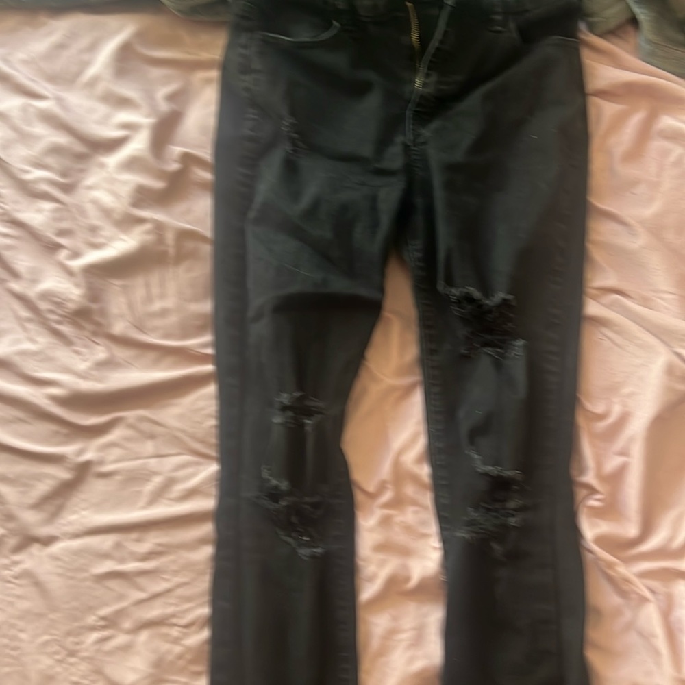 black jeans with rips